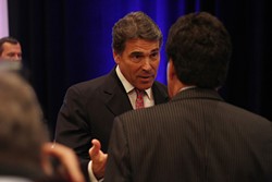 Perry receives less-than-warm welcome in San Antonio