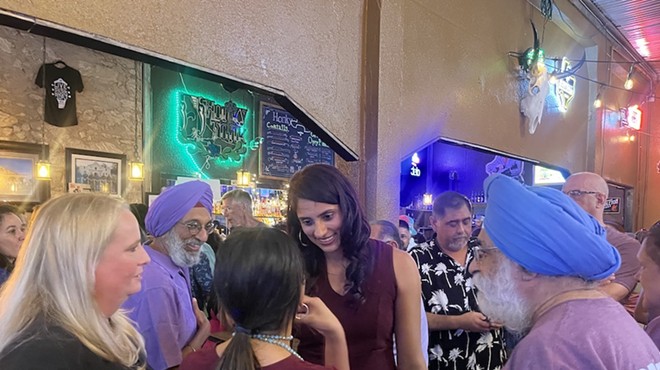 Newly elected District 1 City Councilwoman Sukh Kaur thanks supporters during her watch party at El Honky Tonk on Saturday.