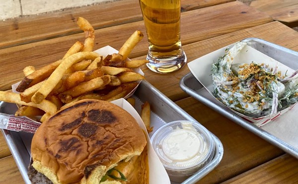 Wurst Behavior offers both burger and hot dog options adorned with its kimchi queso.