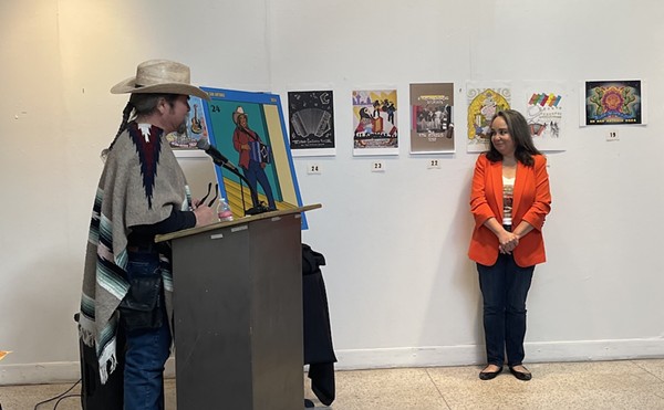 Tejano Conjunto Festival festival founder Juan Tejeda (left) and Guadalupe Cultural Arts Center Executive Director Cristina Ballí unveil the event's new poster.