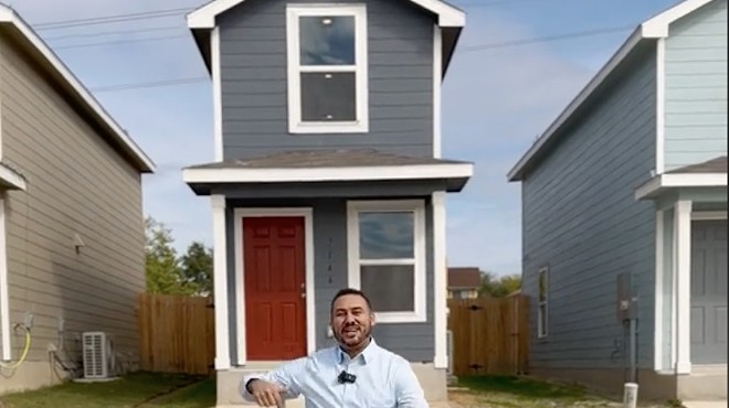 Realtor Billy Rojo stands in front of a tiny home for sale in Northwest San Antonio.