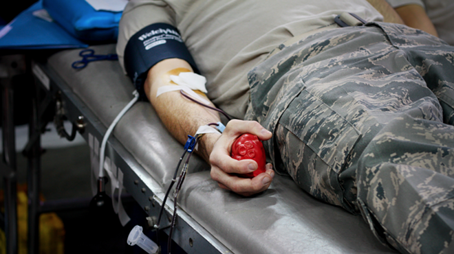 A service member donates blood.