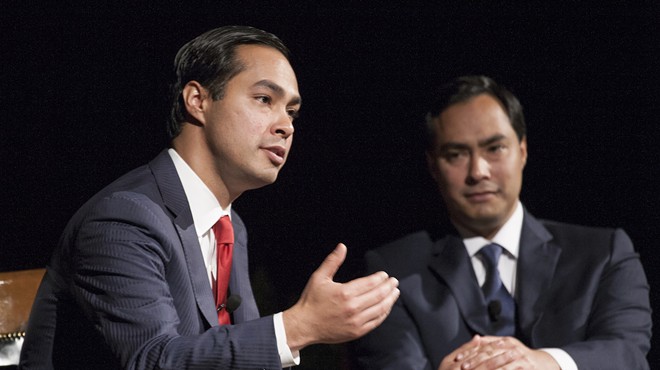 Julian Castro (foreground) makes a point while his brother Joaquin looks on.