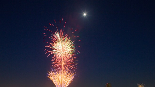 Fireworks explode over Woodlawn Lake.