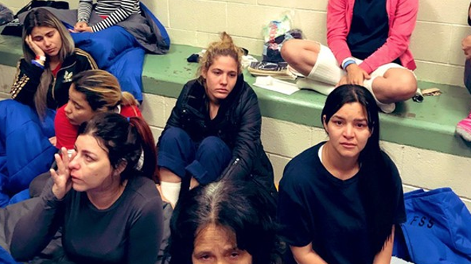 Migrants in ICE detention centers are held in cramped conditions that can enable quick spread of disease, critics charge.