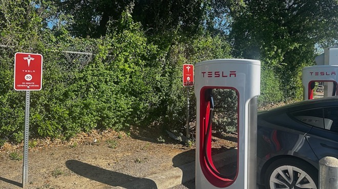 A Tesla charging station in the Huebner Oaks area awaits a vehicle.