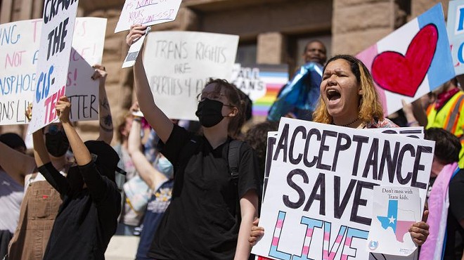 Naia Fulton-Jones chants in front of the Texas Capitol on Mar. 1 to protest for transgender kids’ rights.