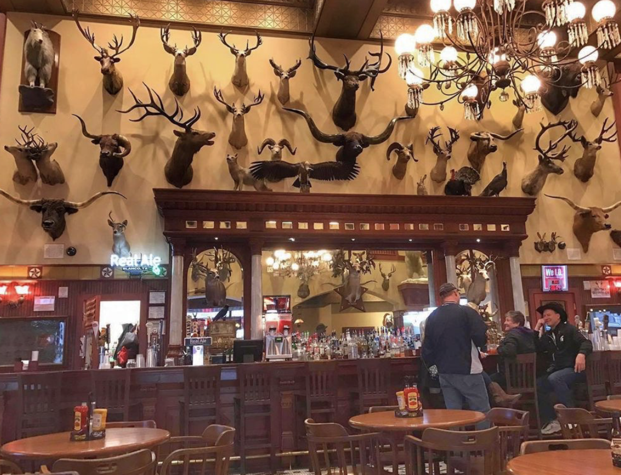 Buckhorn Saloon and Museum
318 E Houston St, (210) 247-4000, buckhornmuseum.com
Belly up to the bar at the “oldest saloon in Texas,” surrounded by hundreds of mounted taxidermy animal busts — if that’s your thing. The historic bar is purportedly whereTeddy Roosevelt recruited Rough Riders and Pancho Villa planned the Mexican Revolution, so history buffs who like to imbibe will feel right at home. 
Photo via Instagram / visitsanantoniotx