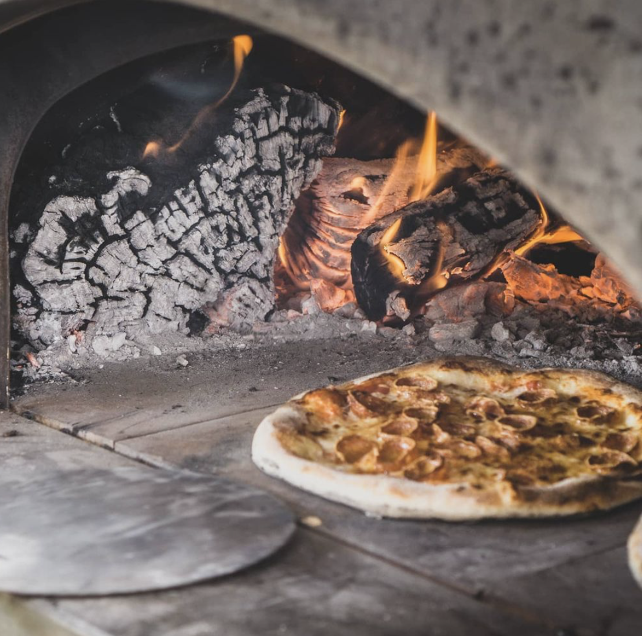 Stone Bros. Mobile Pizzas
Location Varies, stonebrostx.com
This pizza trailer taps into over 30 years of pizza-making expertise to offer rustic-style pies made in a custom wood-burning oven. 
Photo via Instagram / stonebrostx