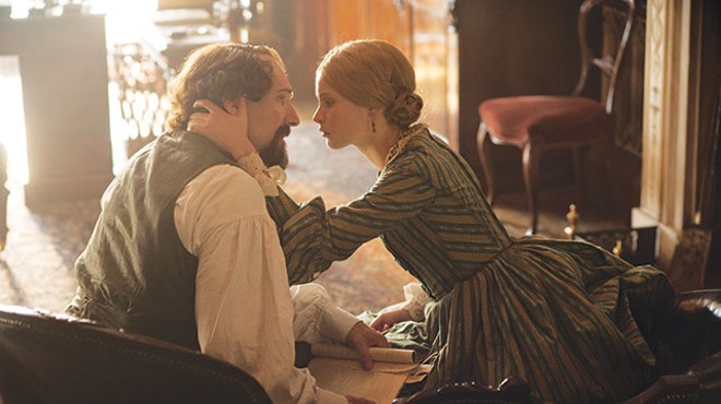 Charles Dickens (Ralph Fiennes) and Nelly Ternan (Felicity Jones) share a moment in 'The Invisible Woman.' The affair lasted until the end of his days.