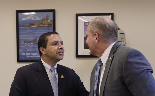 Rep. Henry Cuellar, left, greets a U.S. Customs and Border Protection in Washington ahead of a 2020 hearing.