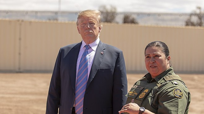 President Trump visits the U.S.-Mexico border last year to see the installation of a new section of wall.