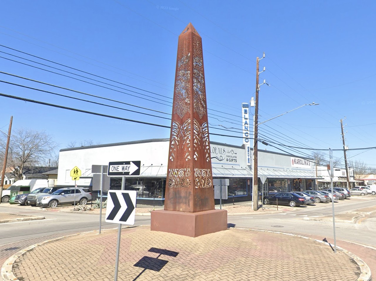 Midtown on Blanco: The traffic circle with the sculpture in the middle that drunks keep plowing into.
How can anyone not notice a giant metal pylon surrounded by concrete in their path?