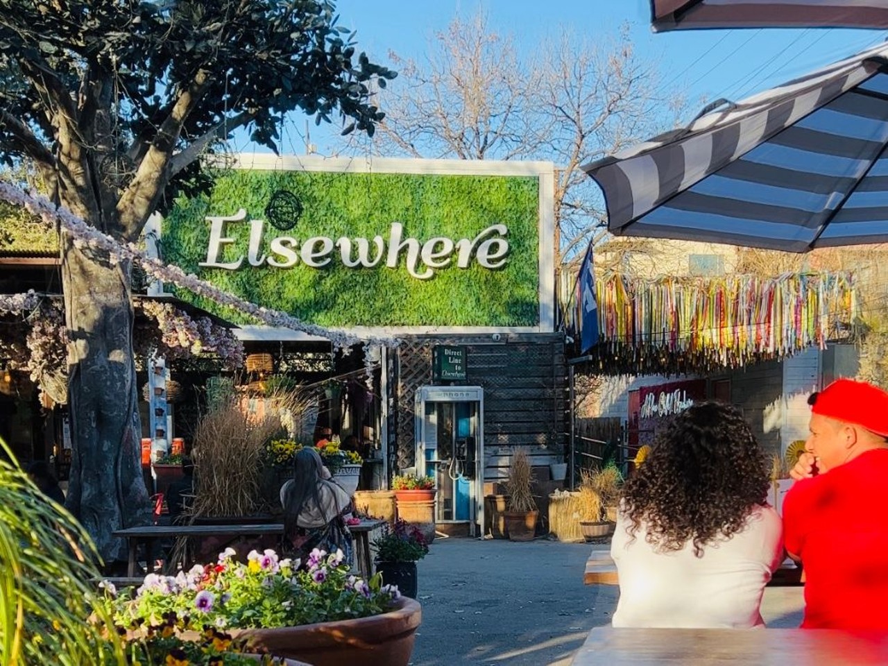 Elsewhere Garden Bar & Kitchen 
103 E. Jones Ave., (210) 201-5595, elsewheretexas.com
Elsewhere’s notoriety starts with its impressive outdoor space, replete with larger-than-life art installations including two giant faux-topiary giraffes standing guard over a sign that declares BE KIND. The spot also amps up the ambiance with elevated entertainment like aerial acrobats and fire dancers.
