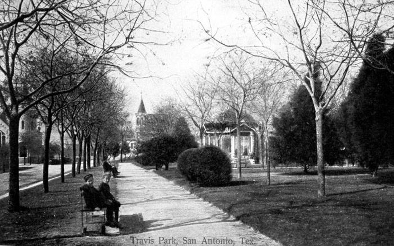 Travis Park, 1910
Two boys sit on a bench on the south side of Travis Park.