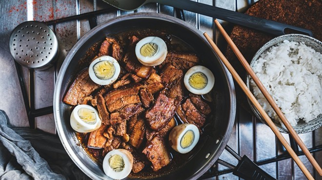 Pork adobo with eggs and rice is a popular dish in the Philippines.