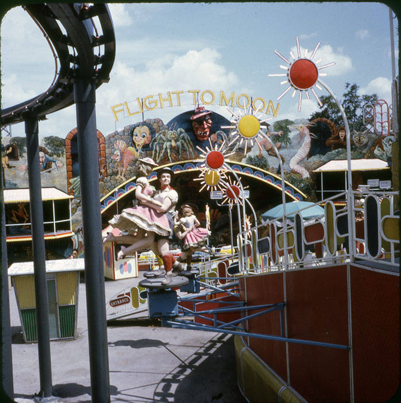 Fiesta Island, rides and games area at HemisFair'68 showing ride "Flight to the Moon"