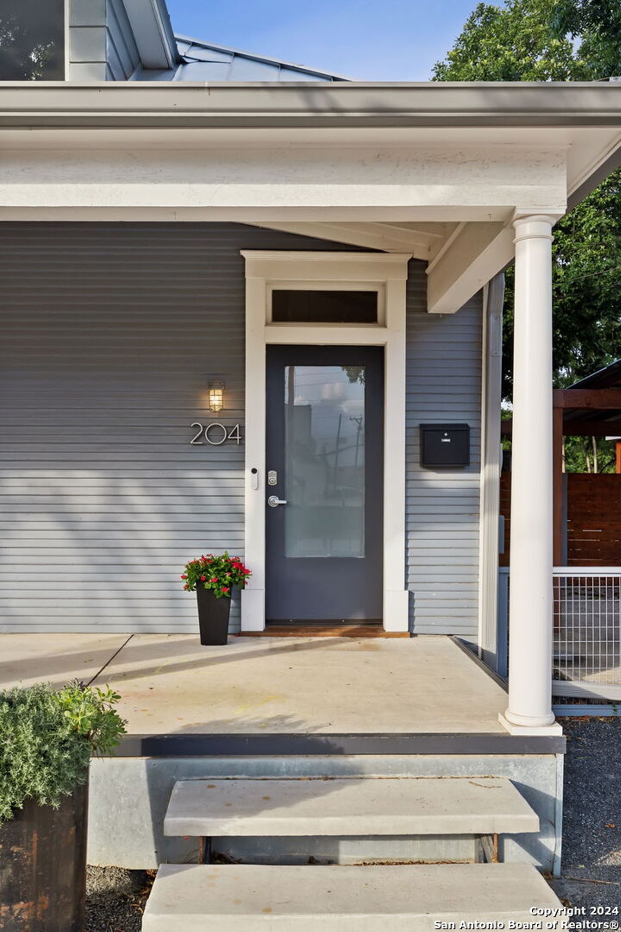 This 1920s King William bungalow has a staircase made out of vintage railroad tracks