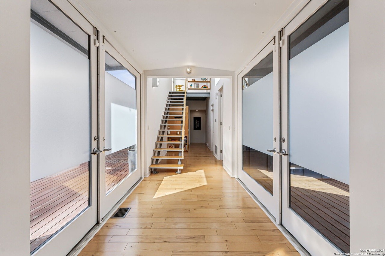 This 1920s King William bungalow has a staircase made out of vintage railroad tracks