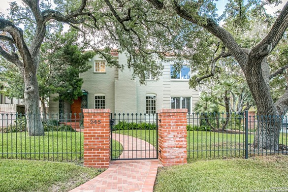 This 1939 home in San Antonio's Olmos Park area has a modern kitchen overlooking its pool