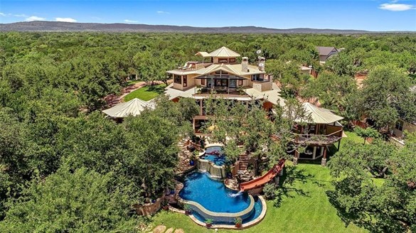 This $4.5 Million House on Lake LBJ Has Its Mini Water Park and a Boat Dock