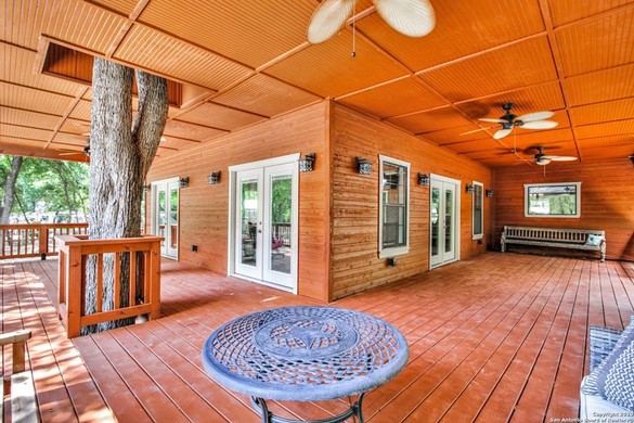 This $739K San Antonio House Has a Giant Patio With a Tree Growing Through It
