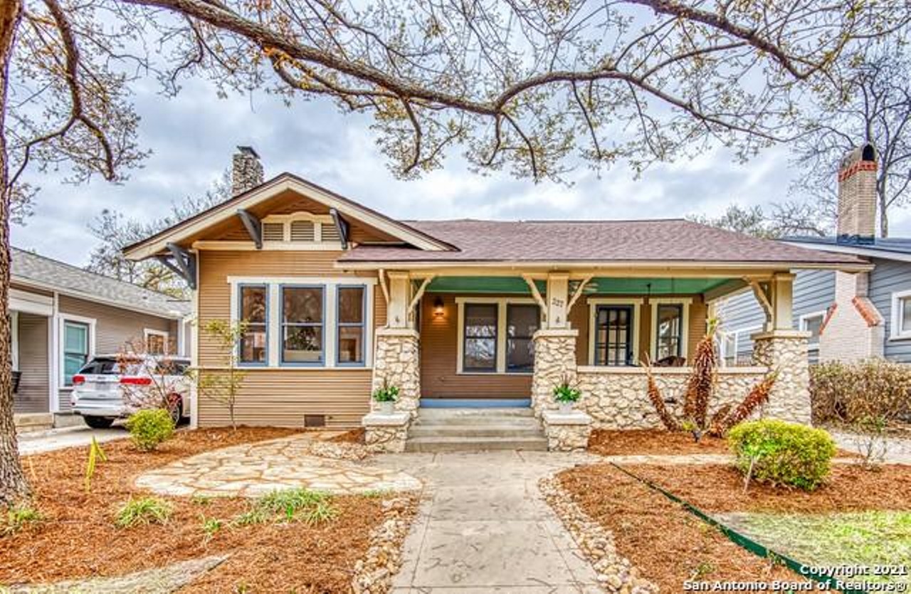 This Craftsman-style house in for sale in San Antonio's Monte Vista has unusual rock columns out front