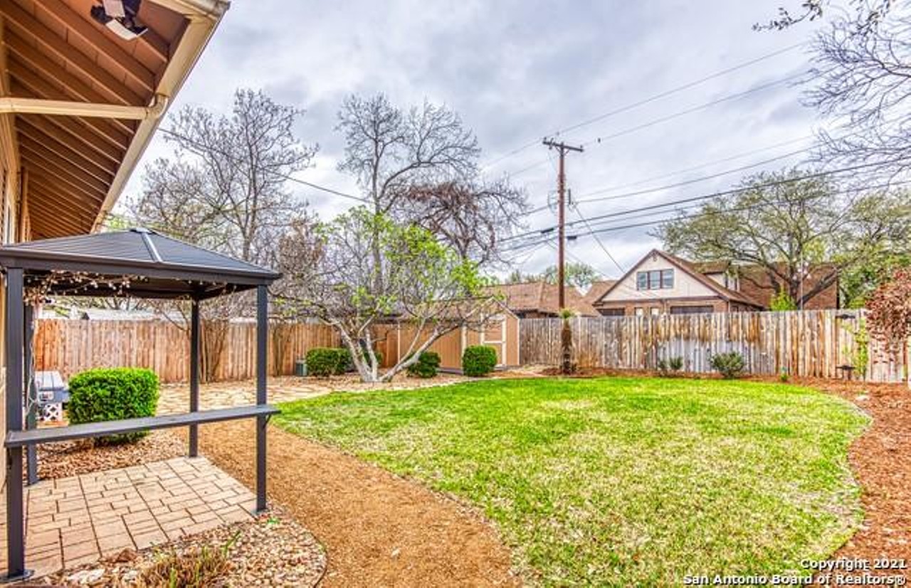 This Craftsman-style house in for sale in San Antonio's Monte Vista has unusual rock columns out front