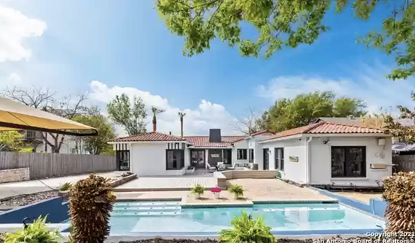 This Miami-style home for sale in San Antonio looks like the perfect place to sip margs by the pool