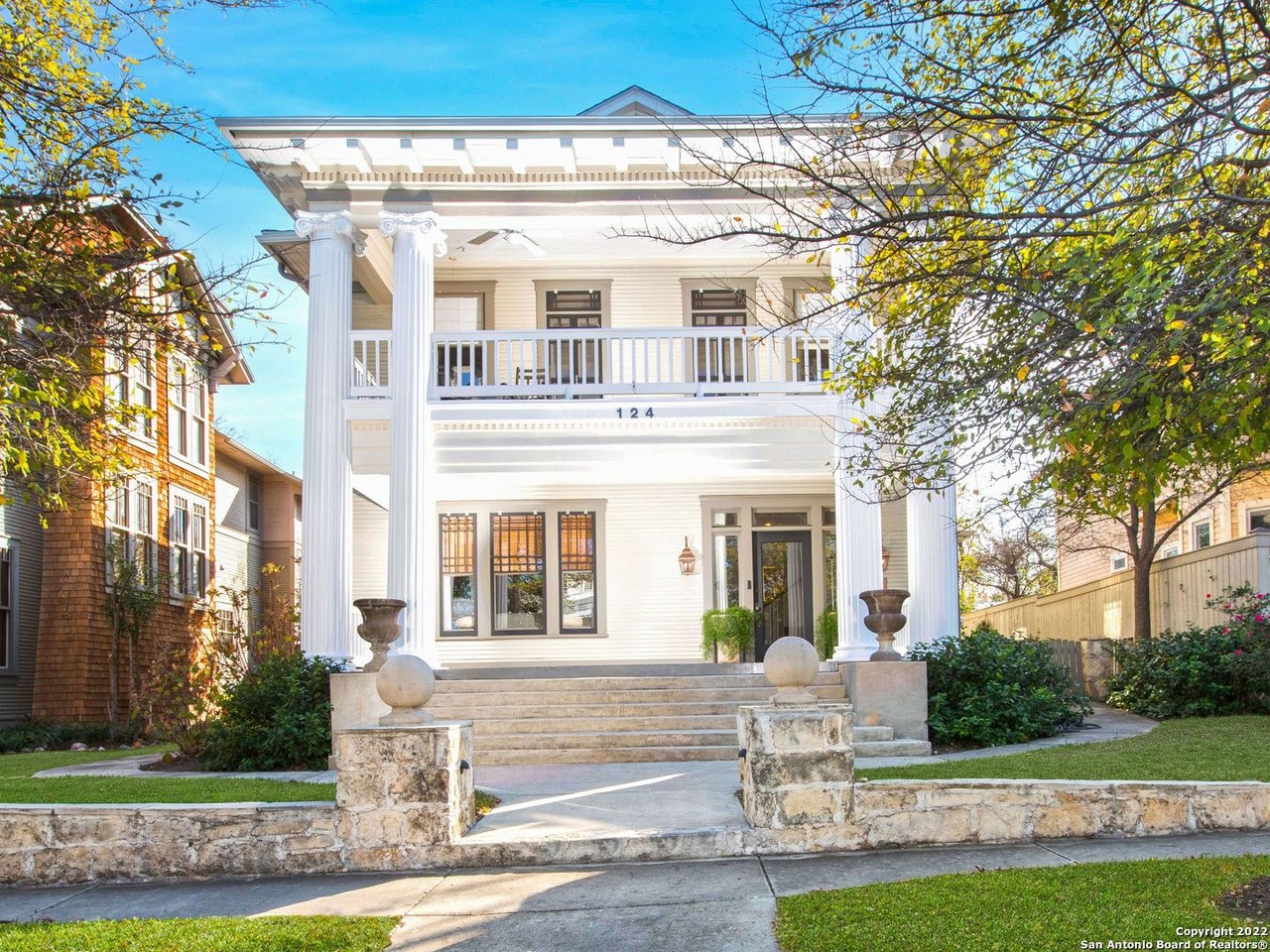 This restored 1913 San Antonio home includes a dining area that opens into a sunroom