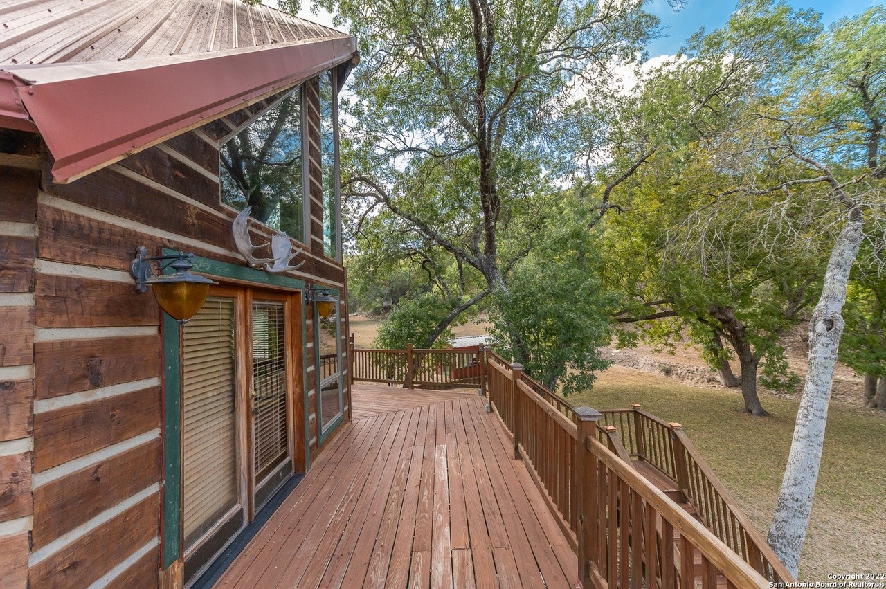 This San Antonio-area log cabin comes with its own on-site hobbit house