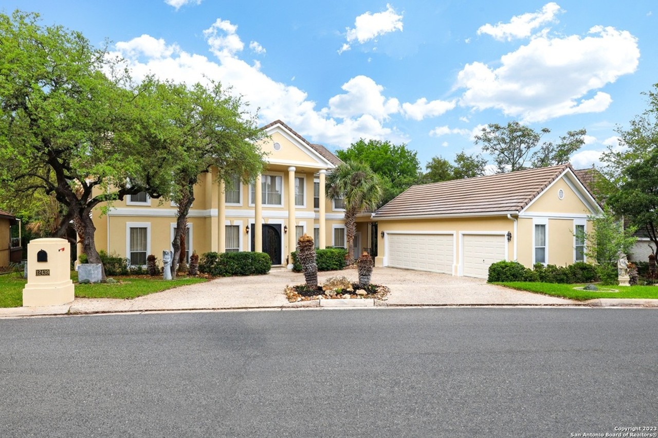 This San Antonio home far sale has dual grand staircases and a private movie theater