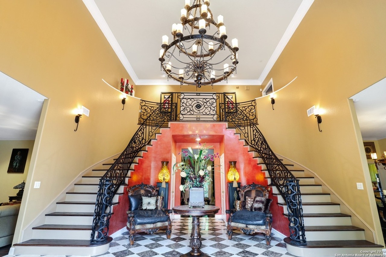 This San Antonio home far sale has dual grand staircases and a private movie theater