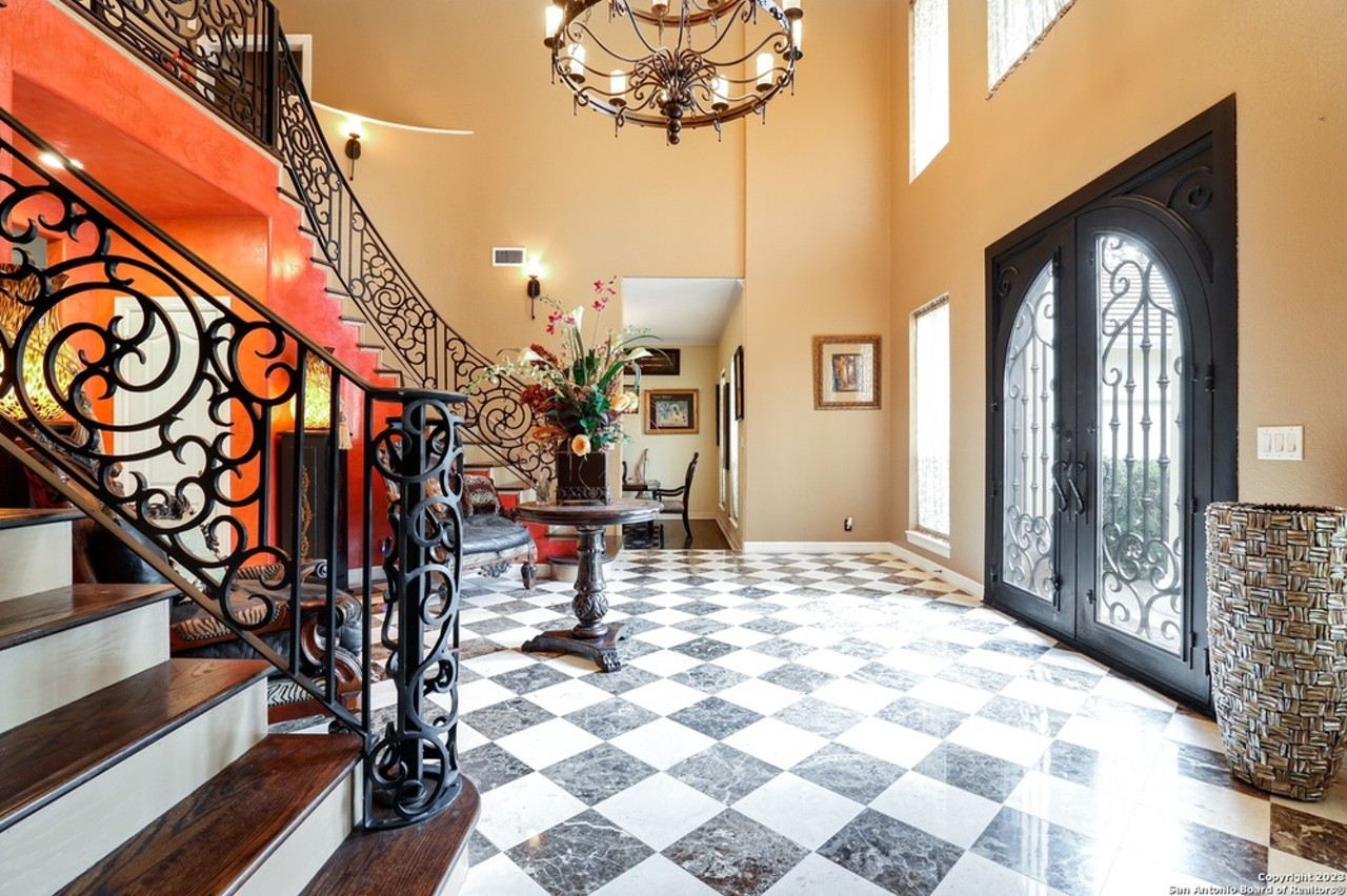 This San Antonio home far sale has dual grand staircases and a private movie theater