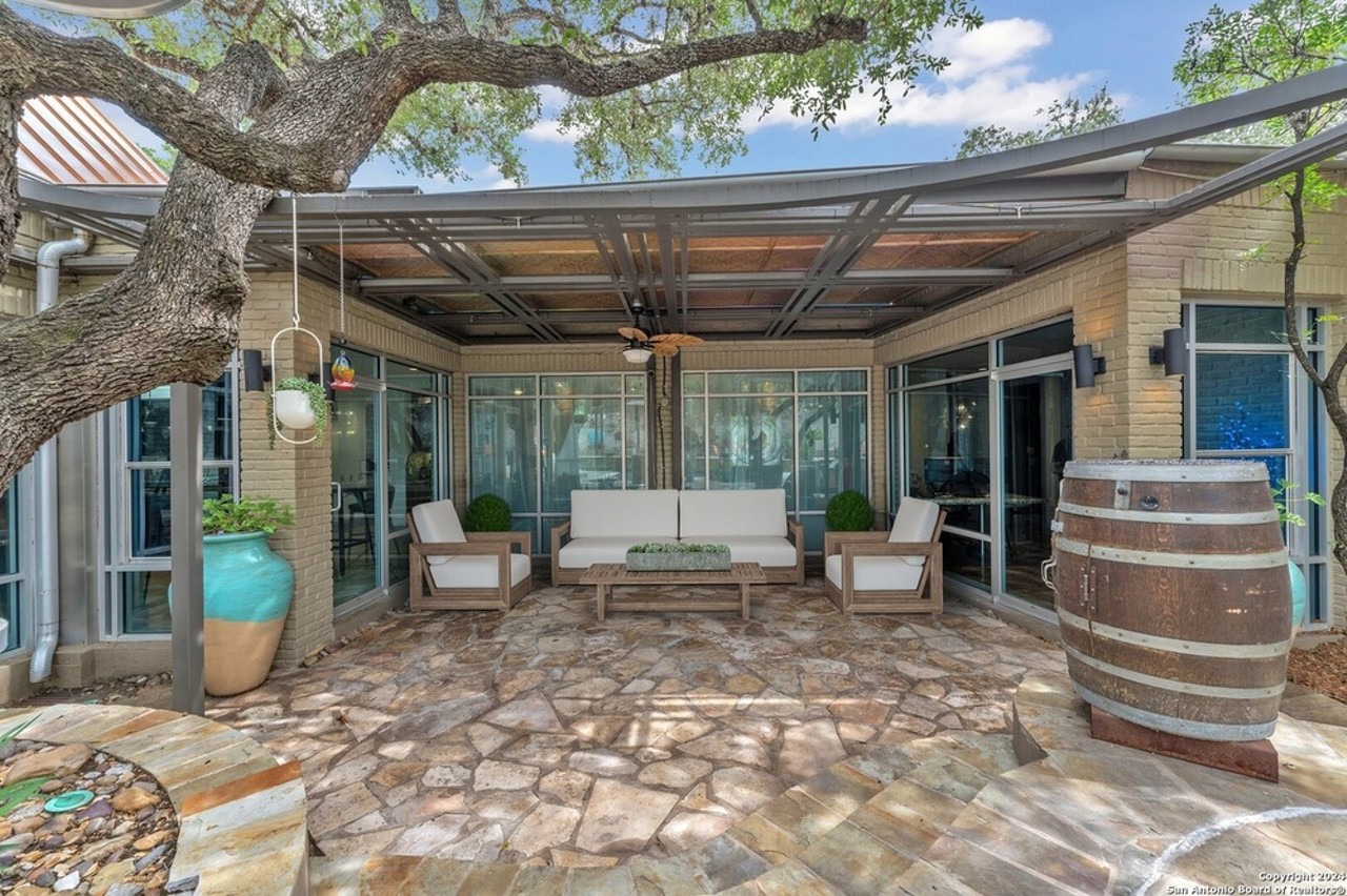 This San Antonio home for sale comes with 20-foot ceilings and a remote-controlled pool