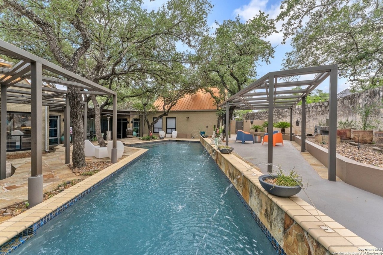 This San Antonio home for sale comes with 20-foot ceilings and a remote-controlled pool