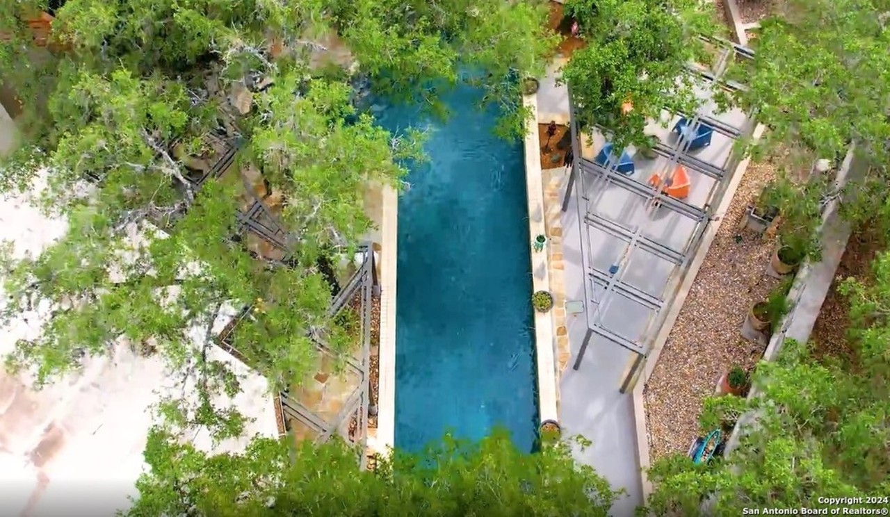 This San Antonio home for sale comes with 20-foot ceilings and a remote-controlled pool