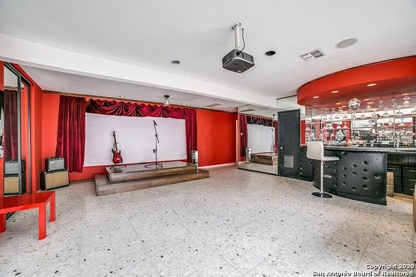 This San Antonio home for sale has a bar and entertainment room straight out of Boogie Nights