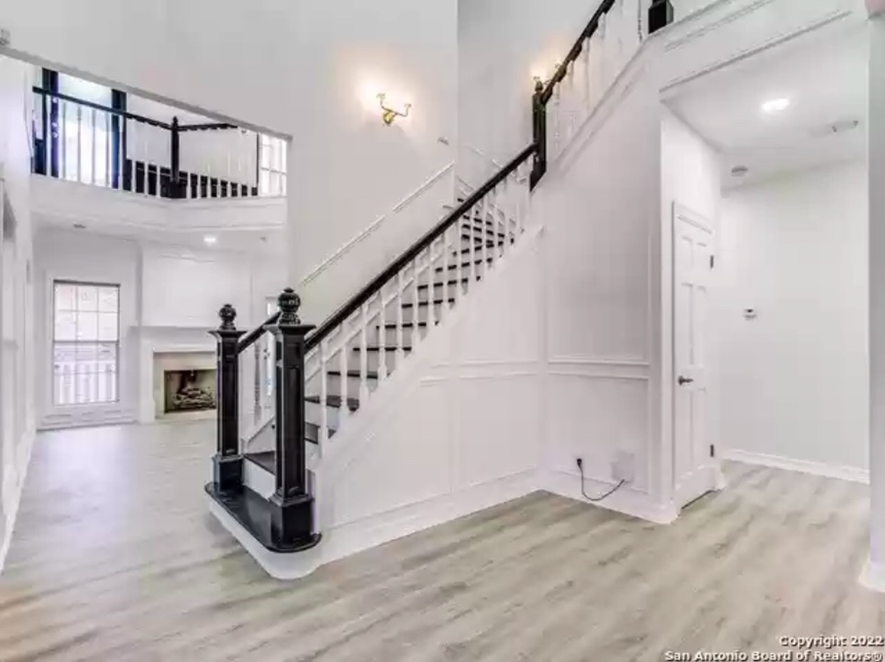 This San Antonio home for sale includes a three-story tower and a room hidden behind a bookcase