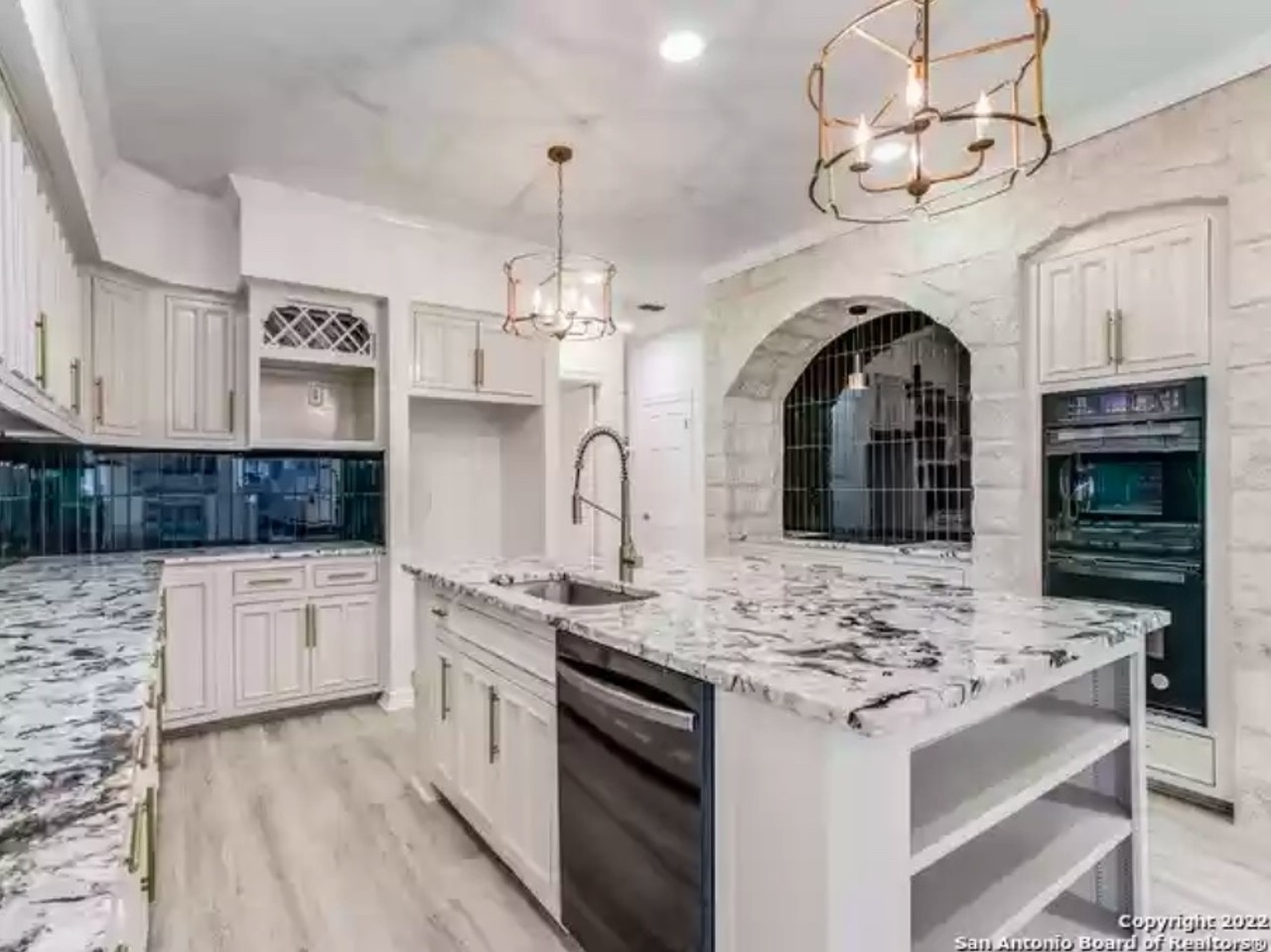 This San Antonio home for sale includes a three-story tower and a room hidden behind a bookcase