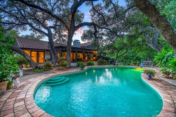 This San Antonio house comes with tennis courts, greenhouses and a private dry-bed creek