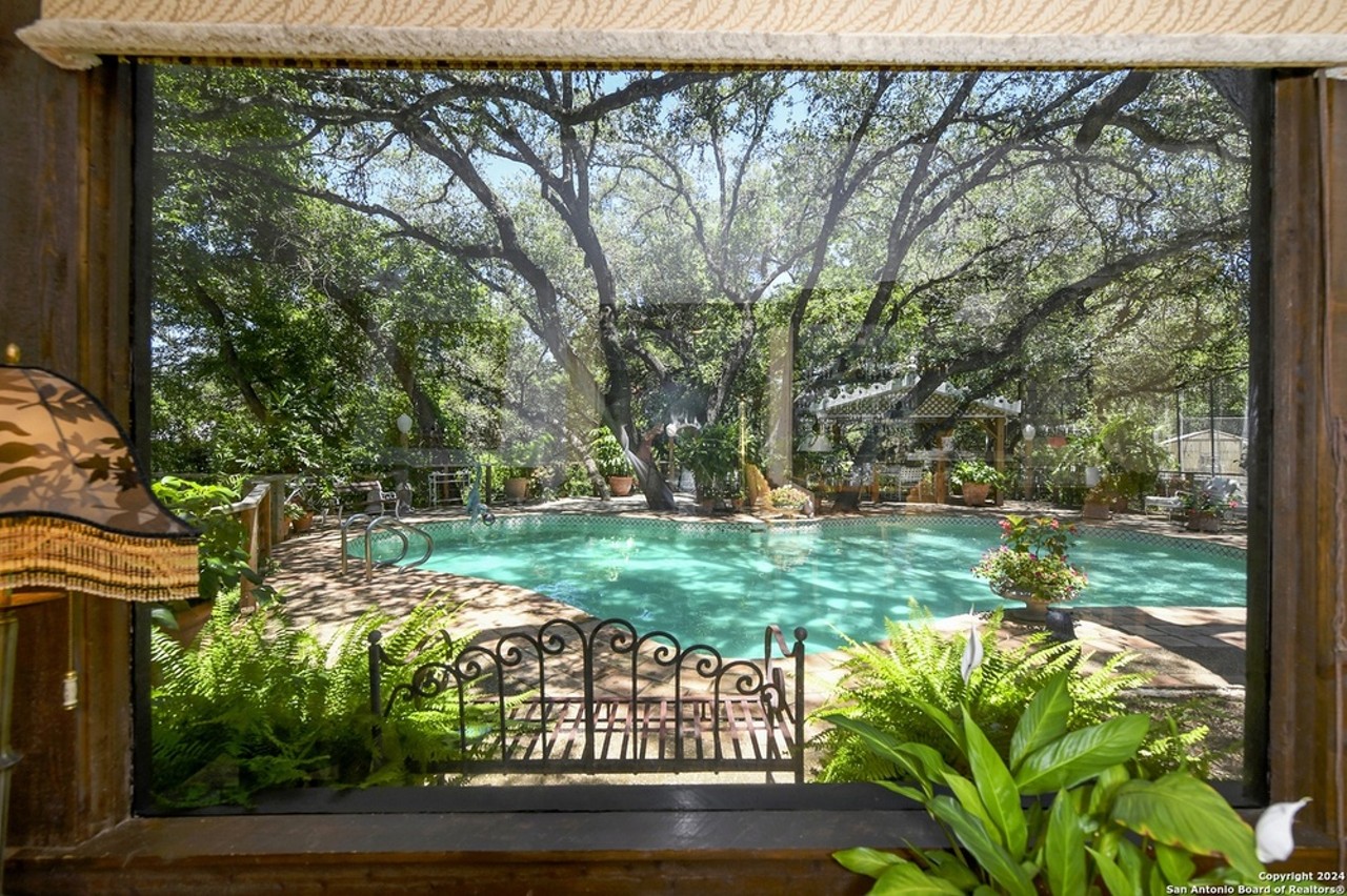 This San Antonio house comes with tennis courts, greenhouses and a private dry-bed creek