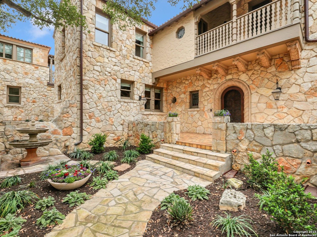 This San Antonio mansion comes with a basement bar-plus-wine cellar and a $250,000 price cut