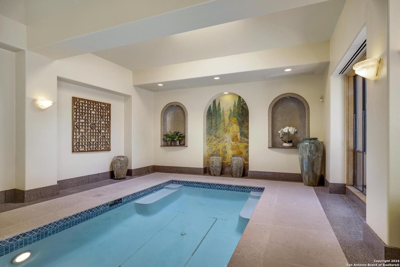 This San Antonio mansion for sale comes with a 63-foot-long indoor lap pool