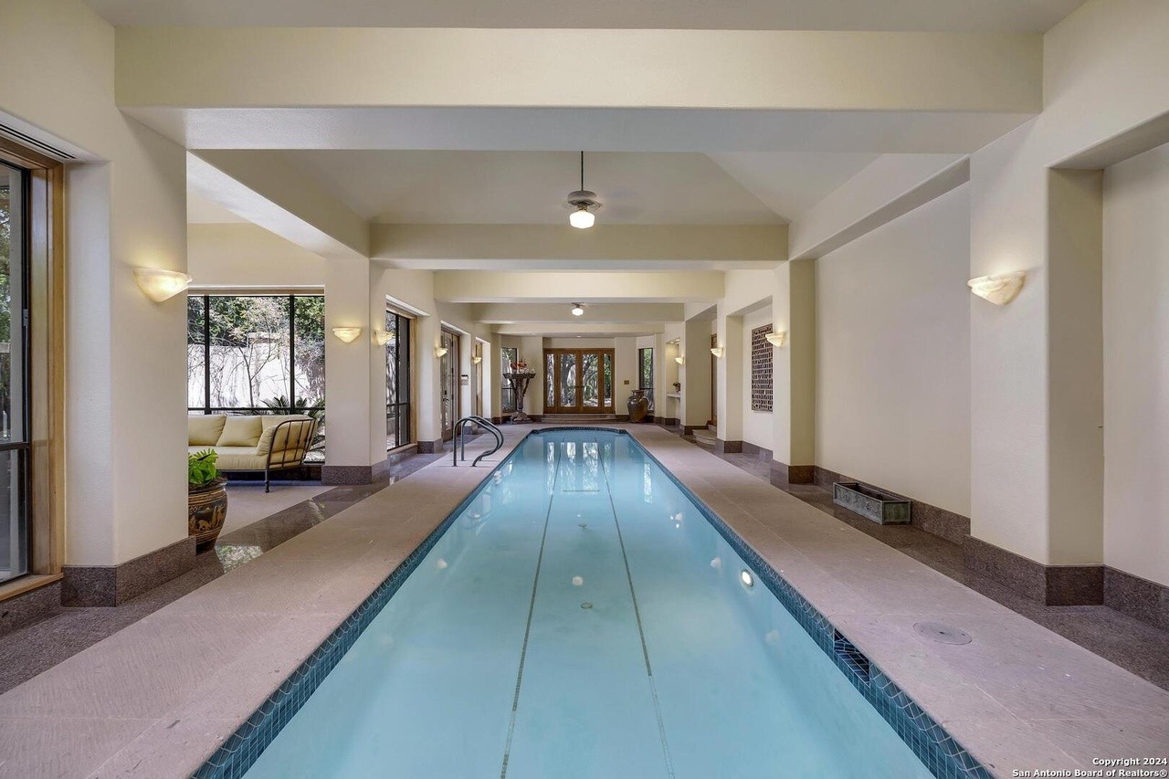 This San Antonio mansion for sale comes with a 63-foot-long indoor lap pool