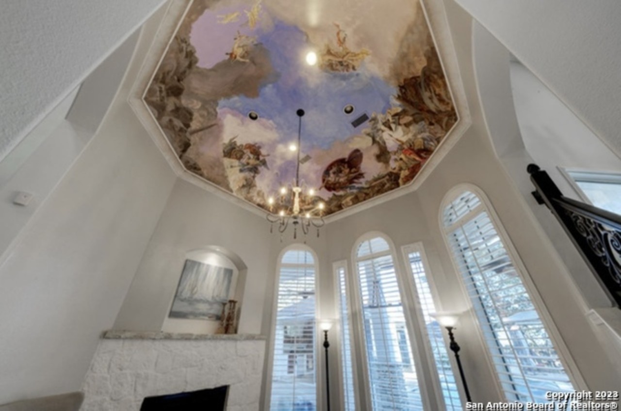 This San Antonio mansion for sale has a frescoed ceiling and a poolside mosaic