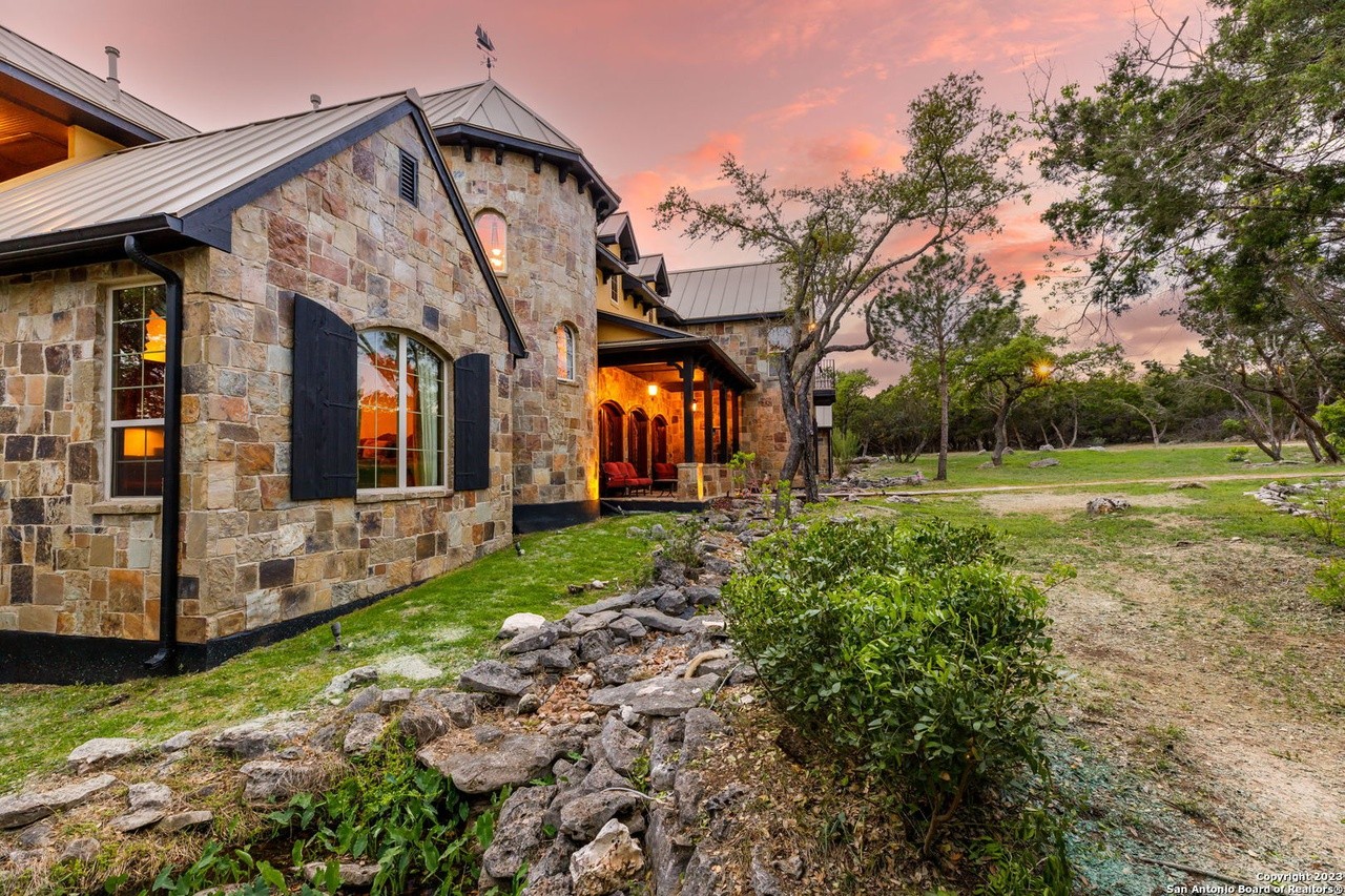 This San Antonio mansion for sale looks like a farmhouse but has multiple swimming pools