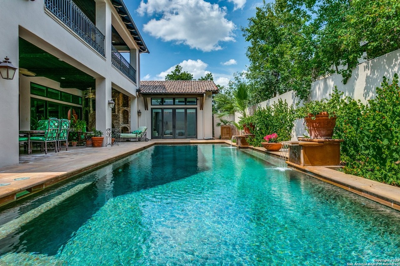 This Spanish-style San Antonio home for sale has a hidden backyard oasis