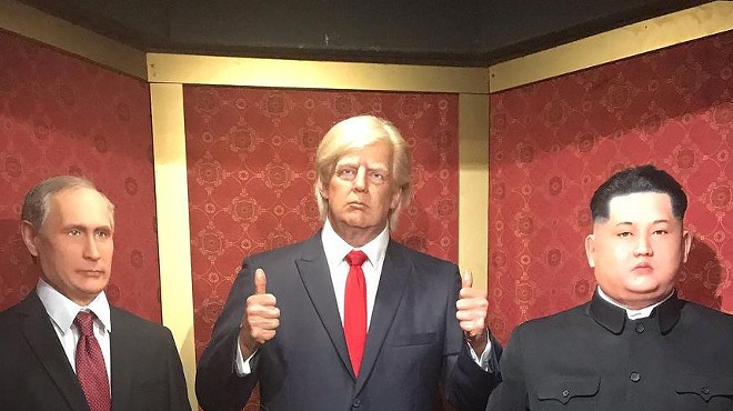 The wax dummy of former President Donald Trump, shown in a visitor's photo, was packed off to storage after people kept punching it. No word on whether his two BFFs also suffered damage.