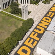 Laredo Residents Complete 'Defund the Wall' Street Mural in Front of Federal Courthouse